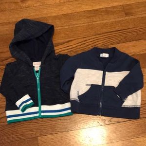 Two Cat & Jack jackets. One NB one 0-3 mo.